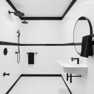 Biała łazienka z czarnymi dodatkami