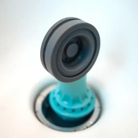 Jak wyciągnąć zassany korek z wanny