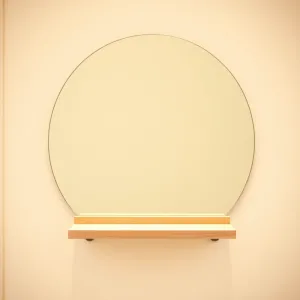 Lustro półokrągłe do przedpokoju z półką