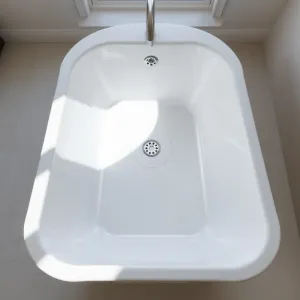 Wanna odpływ na środku czy z boku